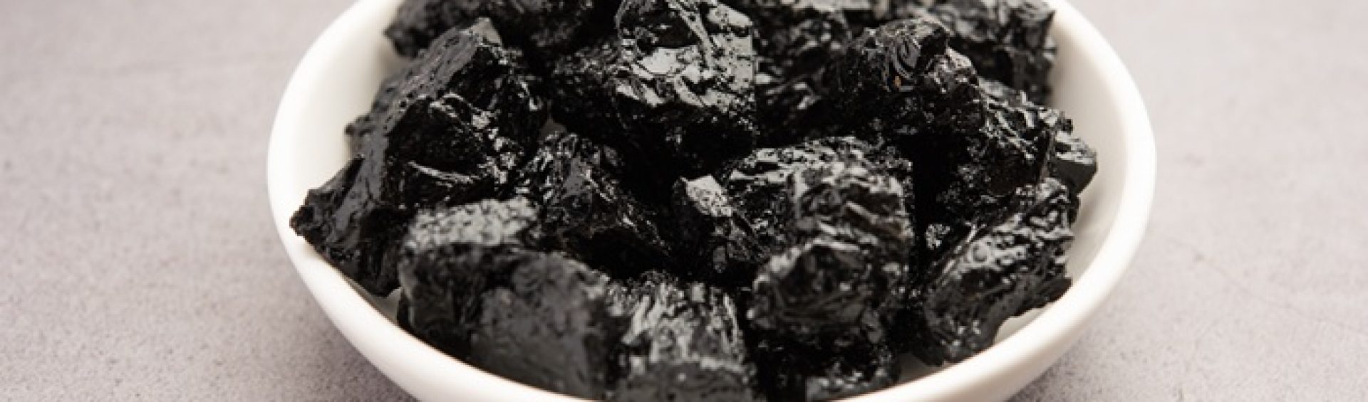 Shilajit is an ayurvedic medicine found primarily in the rocks of the Himalayas. selective focus